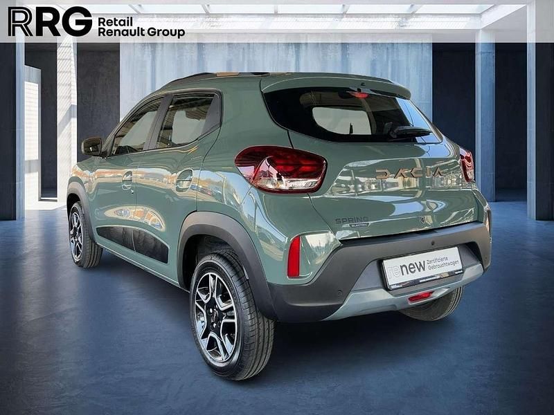 Gebraucht Dacia Spring Extreme 47 kW (65 PS) 2024 Flechtengrau Kleinwagen