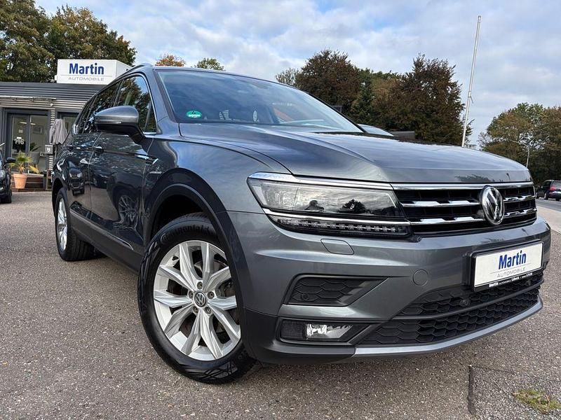 Grau Gebraucht 2018 VW Tiguan Allspace Comfortline SUV | 23.999 € (Fairer Preis) - Bild 1/4