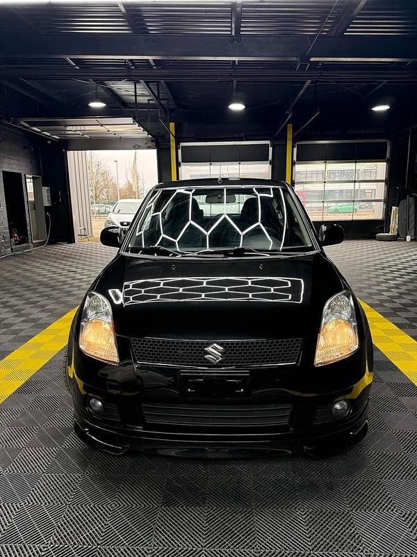 Gebraucht Suzuki Swift 92 PS (67 kW) 2010 Schwarz Kleinwagen