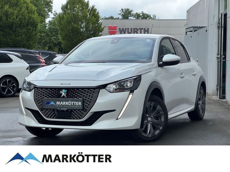 Weiss Gebraucht 2021 Peugeot e-208 Allure Kleinwagen | 15.980 € (Fairer Preis) - Bild 1/4