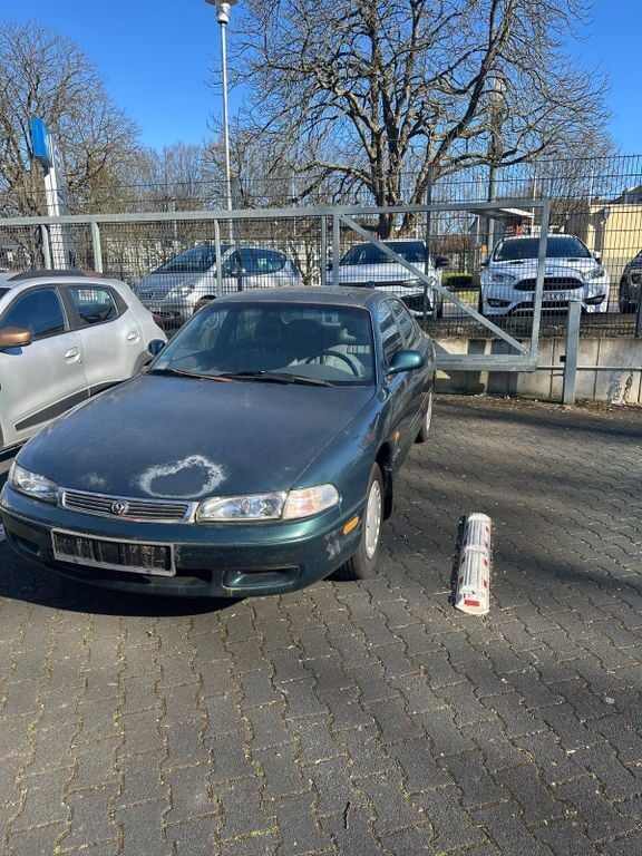 Grün Gebraucht 1994 Mazda 626 Limousine | 2.500 € - Bild 1/4