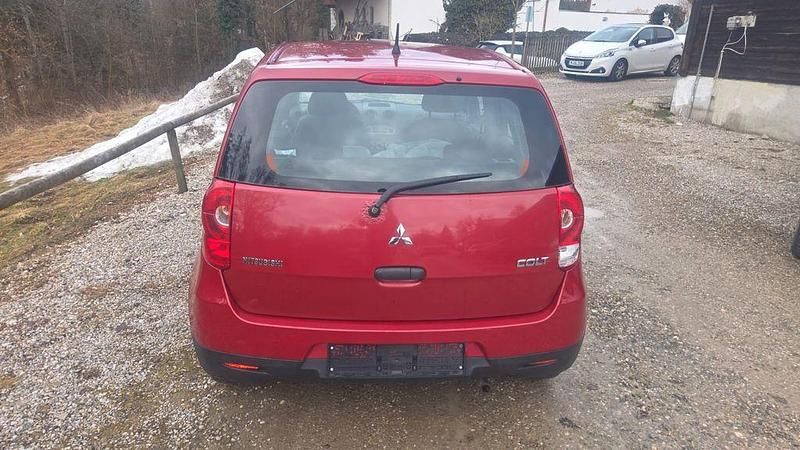 Gebraucht Mitsubishi Colt 75 PS (55 kW) 2009 Rot Kleinwagen