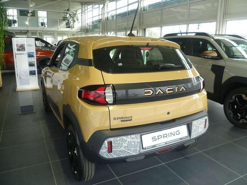 Gebraucht Dacia Spring Extreme 47 kW (65 PS) 2024 Beige safari Kleinwagen
