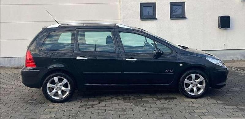 Farbe schwarz obsidan Gebraucht 2007 Peugeot 307 Kombi | 2.980 € (Etwas zu teuer) - Bild 1/4