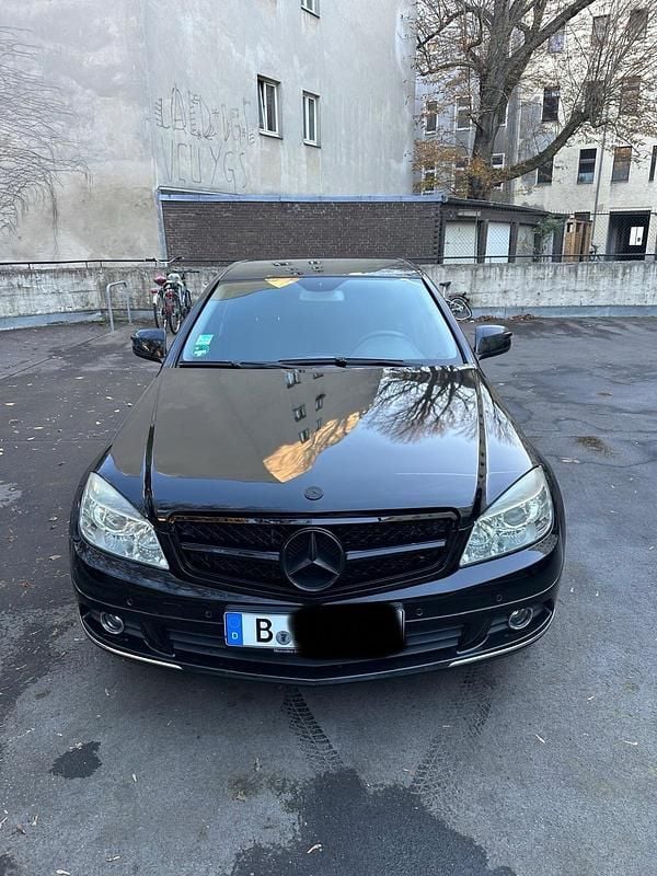 Schwarz Gebraucht 2009 Mercedes C180 AMG Limousine | 10.490 € - Bild 1/4