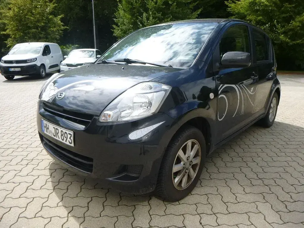 Gebraucht Daihatsu Sirion 91 PS (66 kW) 2009 Schwarz Kleinwagen