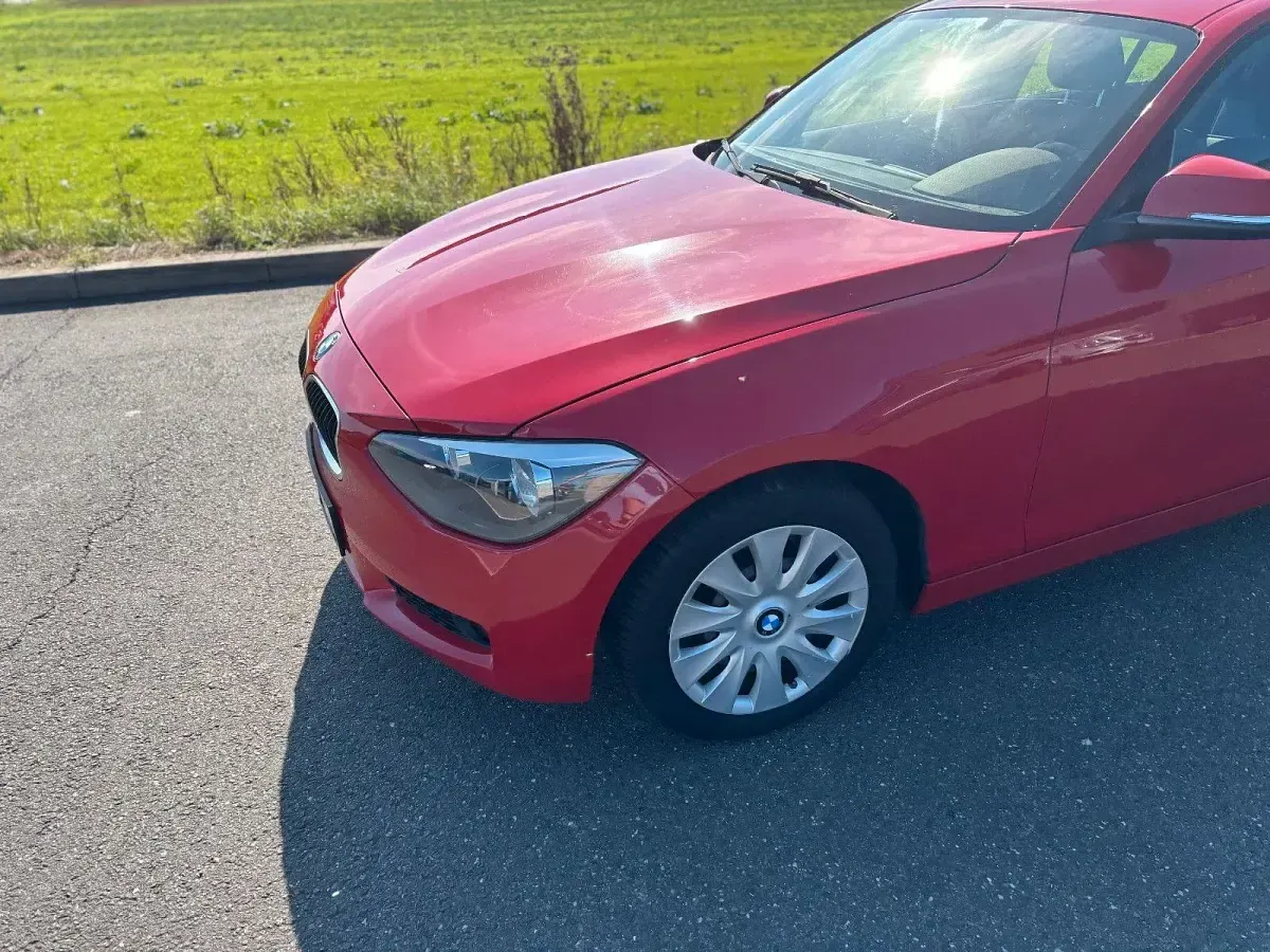 Gebraucht BMW 114 102 PS (75 kW) 2013 Rot Kleinwagen