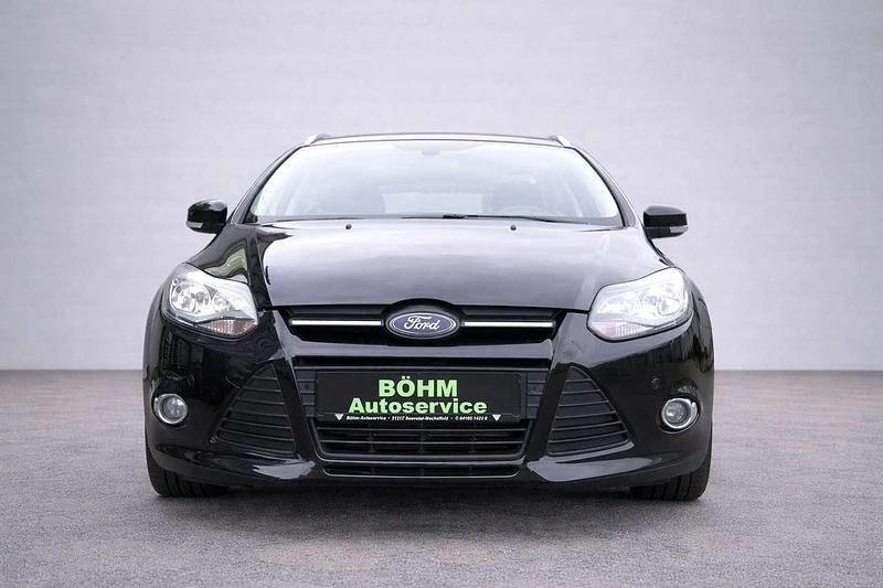 Gebraucht Ford Focus Champions Edition 125 PS (91 kW) 2013 Pantherschwarz metallic Kombi