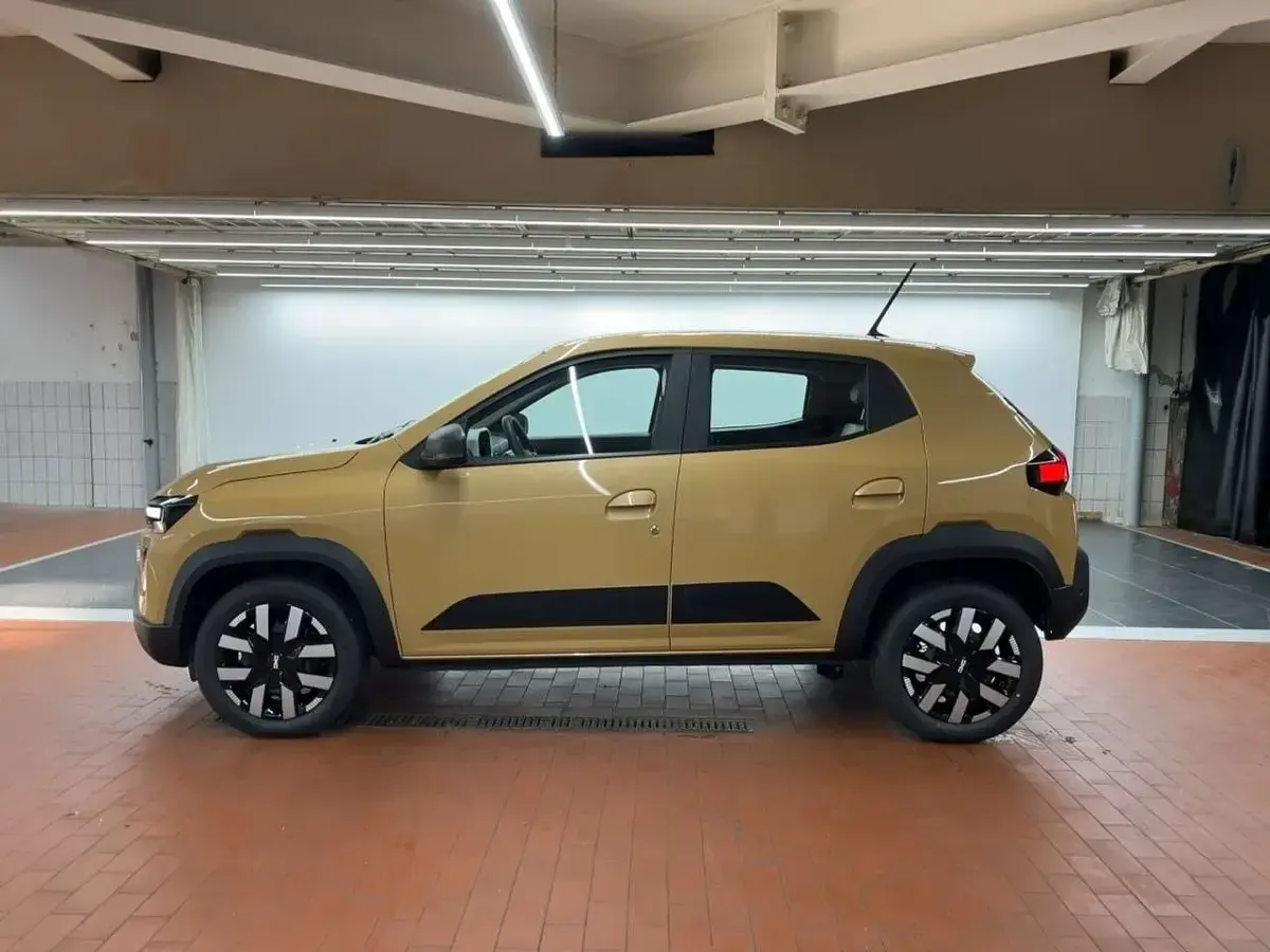 Gebraucht Dacia Spring Expression 19 kW (26 PS) 2025 Safaribeige Kleinwagen