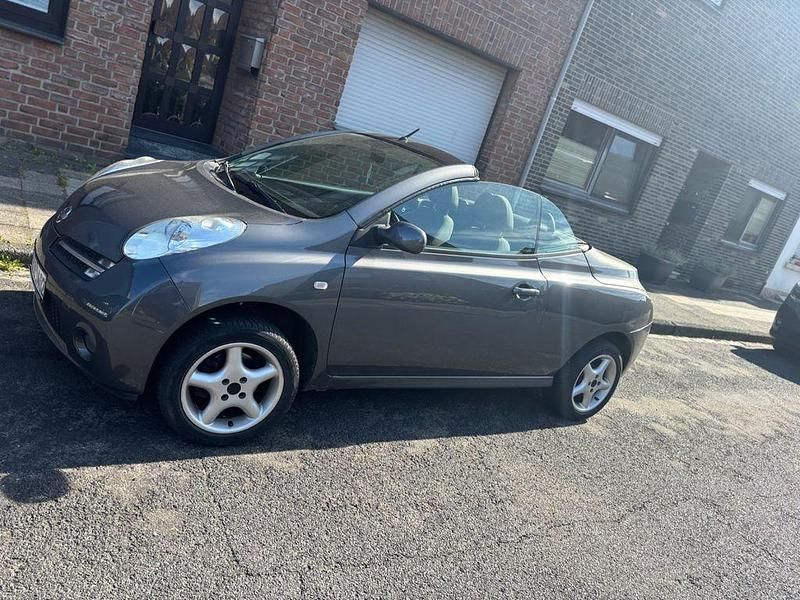 Grau Gebraucht 2007 Nissan Micra C+C Cabrio | 1.800 € (Fairer Preis) - Bild 1/4