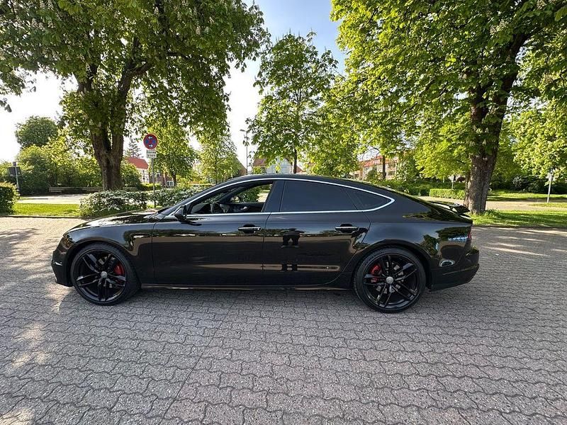 Schwarz Gebraucht 2015 Audi A7 Sportback Comfort Kleinwagen | 22.499 € (Fairer Preis) - Bild 1/4