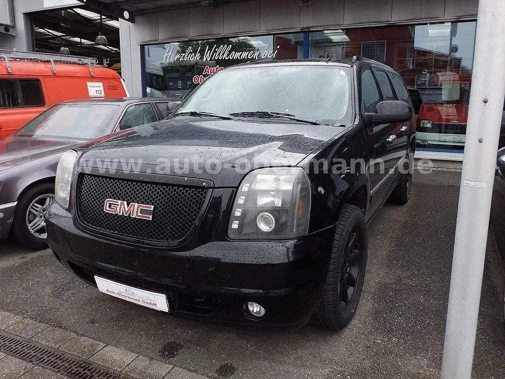 Używany GMC Yukon 409 KM (300 kW) 2012 Czarny SUV