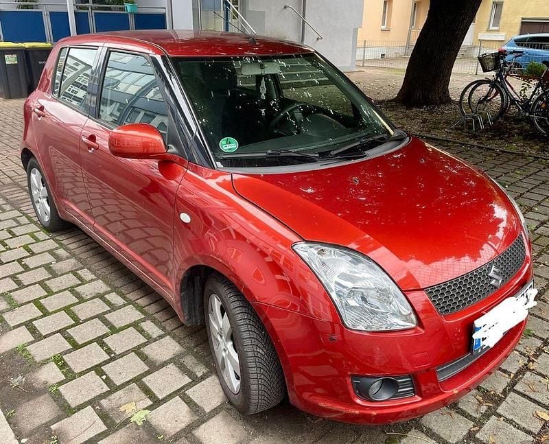 Orange Gebraucht 2009 Suzuki Swift Comfort Limousine | 2.650 € (Guter Preis) - Bild 1/4
