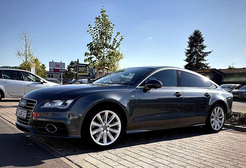 Grau Gebraucht 2012 Audi A7 Kleinwagen | 19.999 € (Fairer Preis) - Bild 1/4