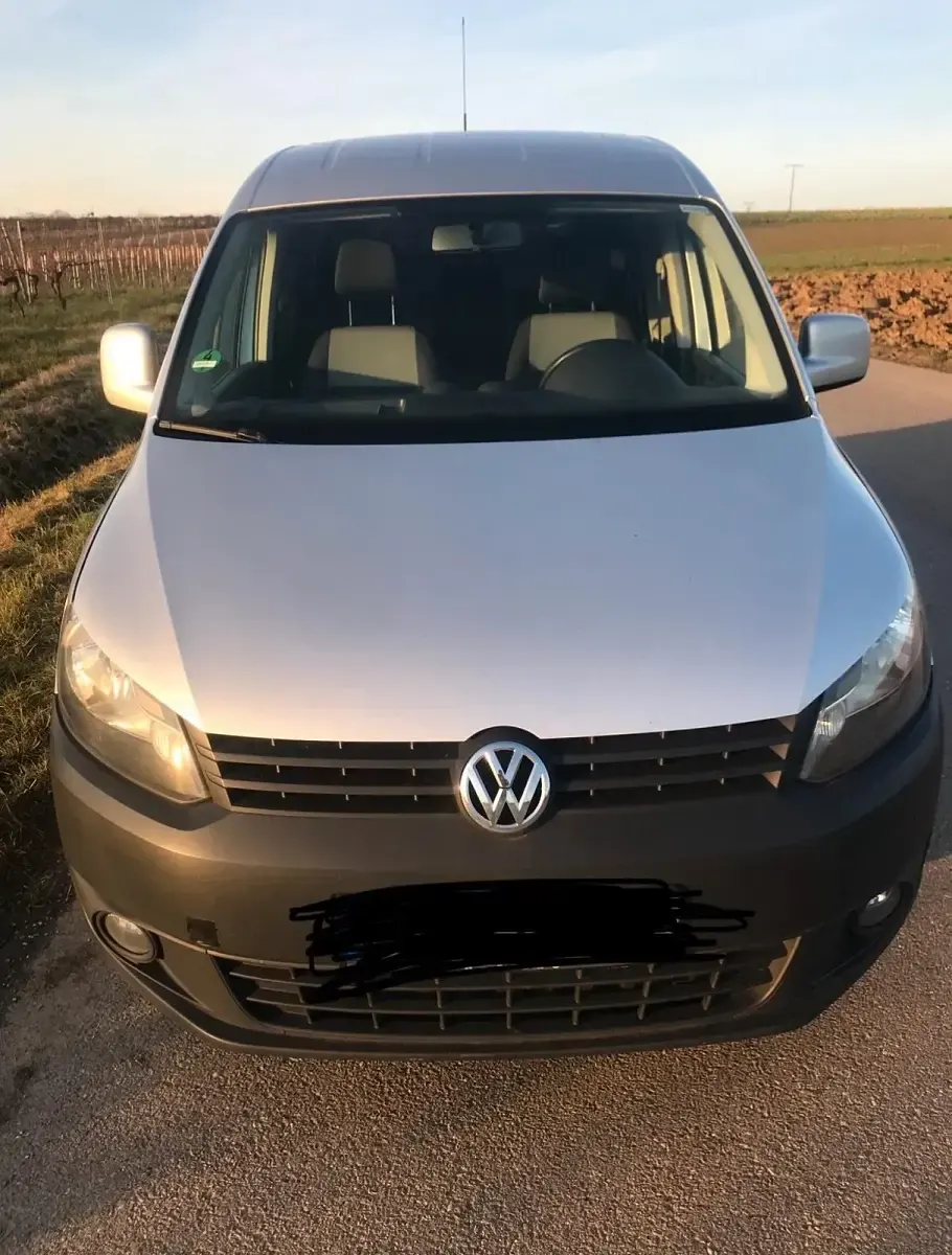 Second-hand VW Caddy 105 CP (77 kW) 2011 Argintiu Monovolum