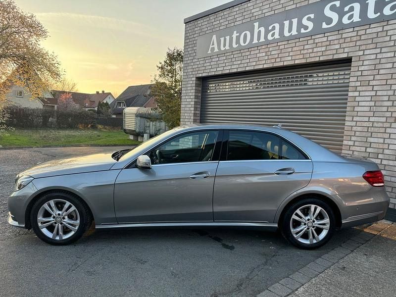 Second-hand Mercedes E200 184 CP (135 kW) 2013 Argintiu Berlinǎ