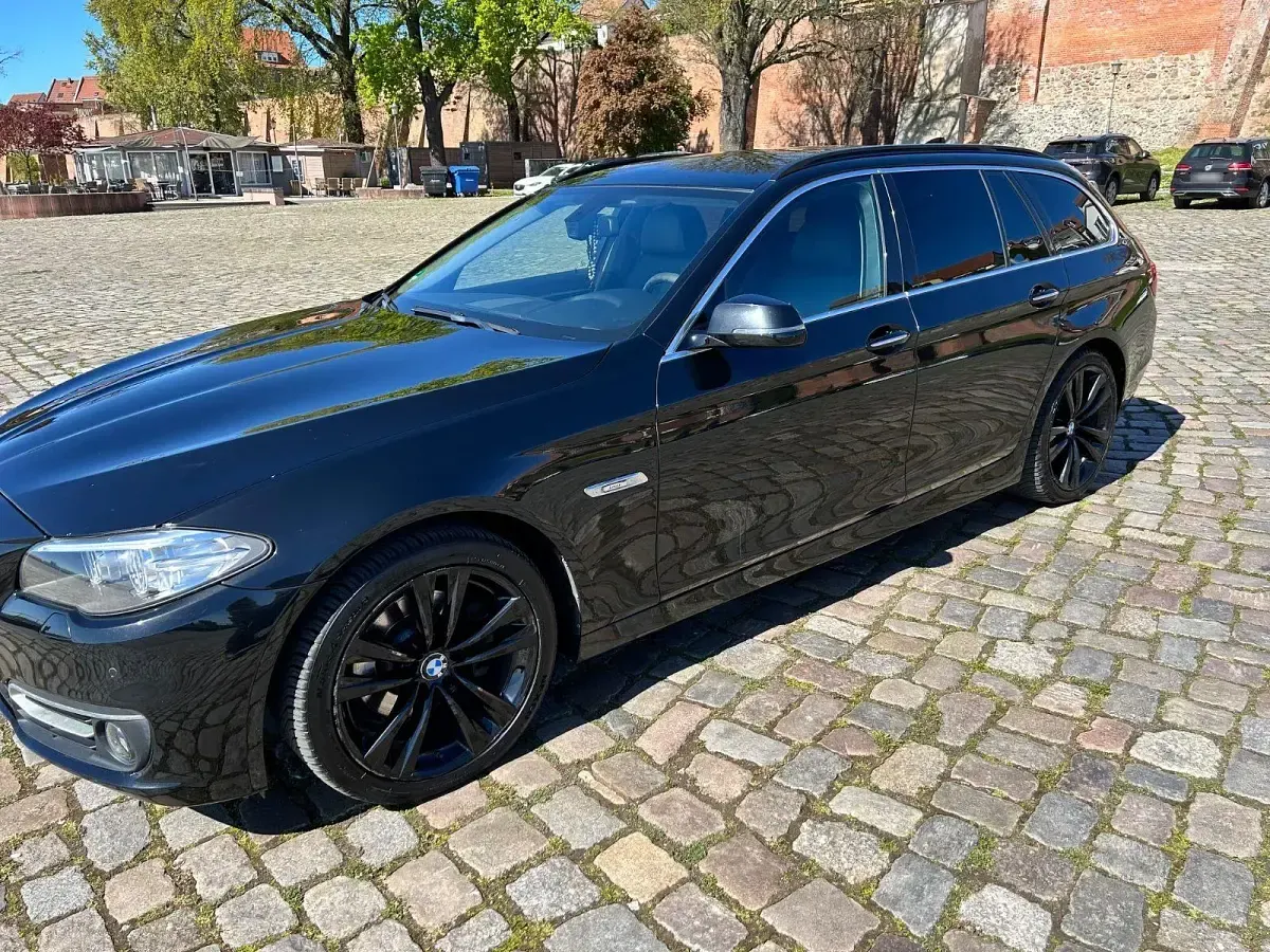 Second-hand BMW 520 Luxury Line 190 CP (139 kW) 2015 Negru Break