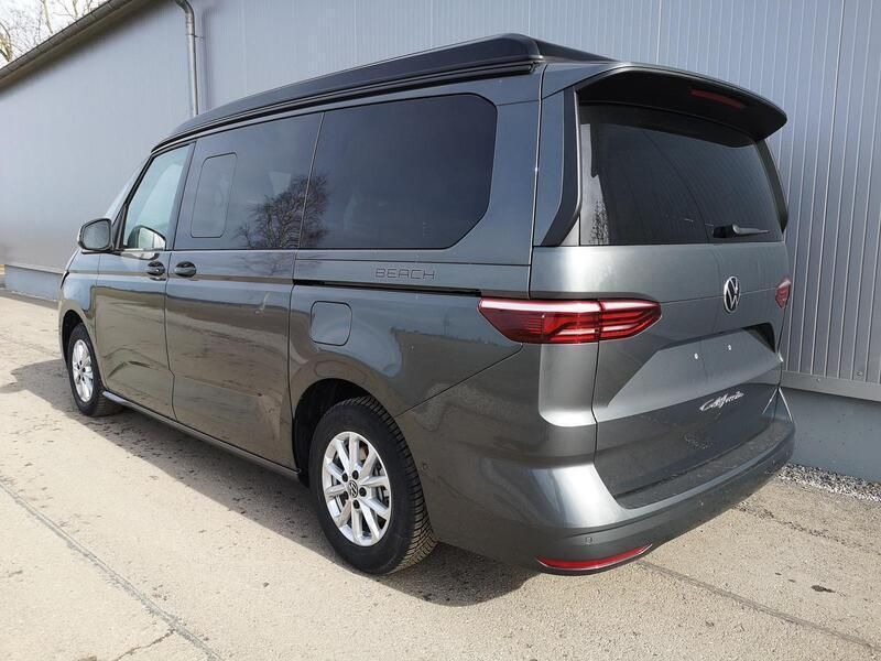 Gebraucht VW T7 Comfortline 150 PS (110 kW) 2024 Mediumblau metallic dach schwarz Van