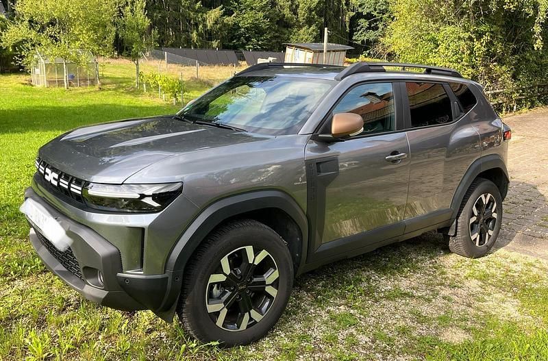 Grau Gebraucht 2024 Dacia Duster Extreme SUV | 30.299 € (Teuer) - Bild 1/4