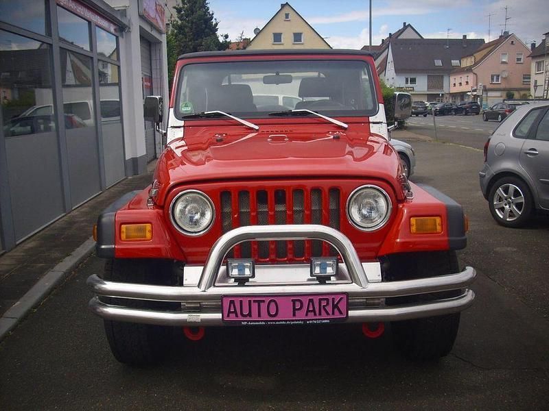 Rot Gebraucht 1999 Jeep Wrangler Rubicon SUV | 14.950 € - Bild 1/4