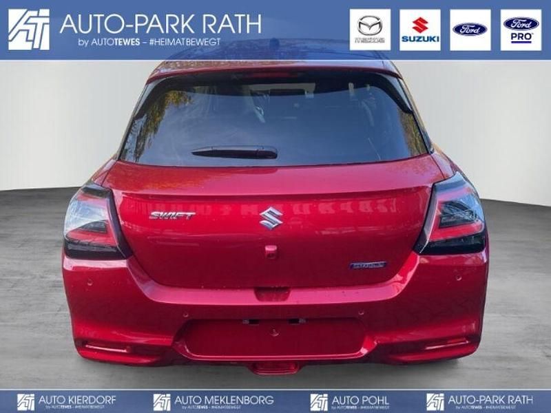 Gebraucht Suzuki Swift Comfort 82 PS (60 kW) 2024 Burning red pearl metallic (rot) Kleinwagen