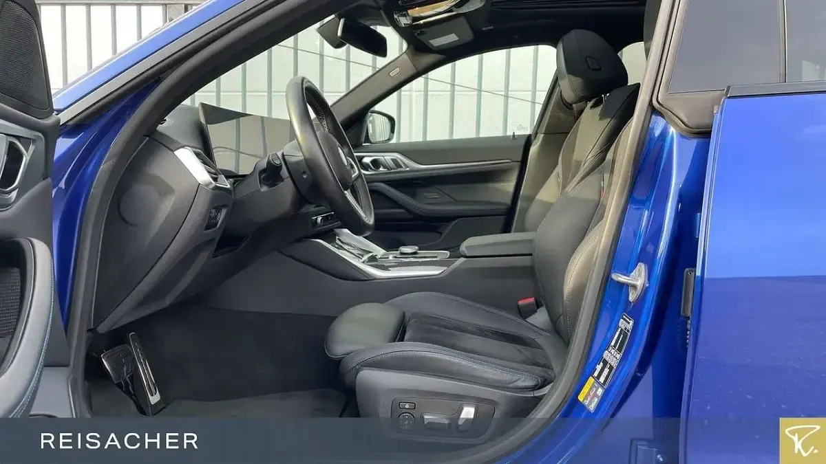 Gebraucht BMW i4 Performance 350 kW (476 PS) 2023 M portimao blau metallic Limousine