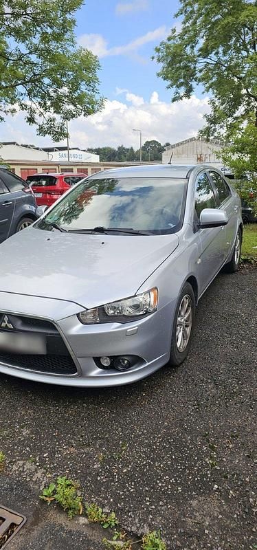 Gebraucht Mitsubishi Lancer 117 PS (86 kW) 2010 Silber Limousine