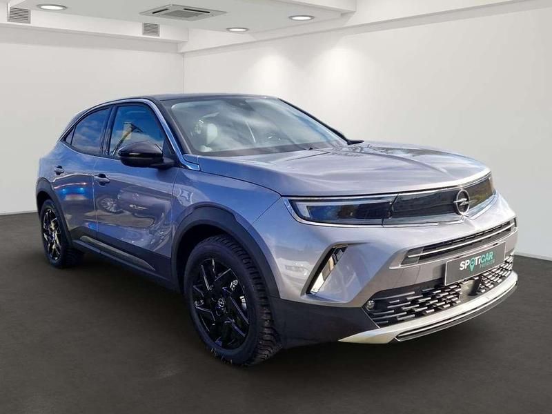 Gebraucht Opel Mokka-e Elegance 100 kW (136 PS) 2023 Kontrast grau (metallic) SUV