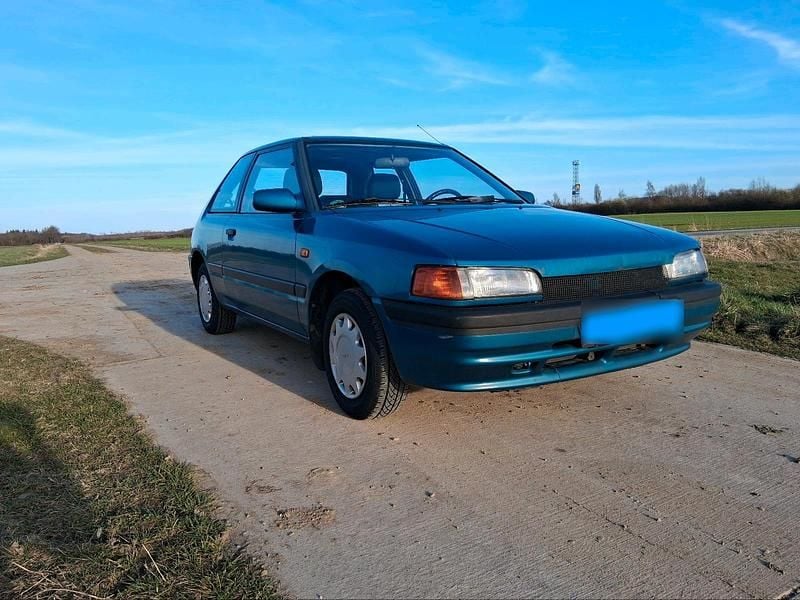 Gebraucht Mazda 323 73 PS (53 kW) 1993 Grün Kleinwagen