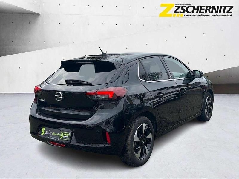 Gebraucht Opel Corsa-e Elegance 100 kW (136 PS) 2021 Diamant schwarz/karbon schwarz Kleinwagen