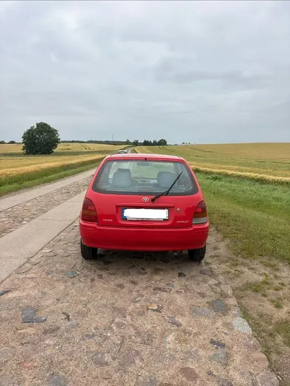 Gebraucht Toyota Starlet 75 PS (55 kW) 1998 Rot Kleinwagen