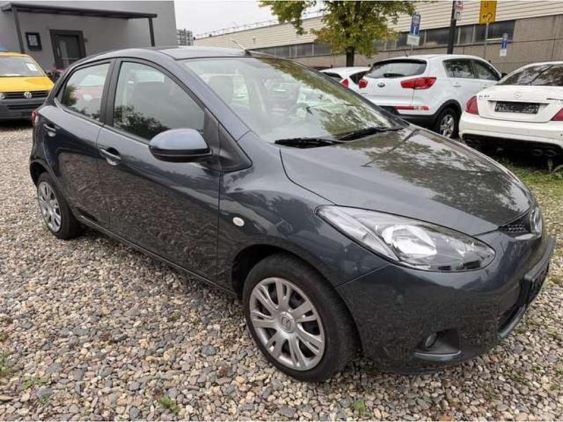 Gebraucht Mazda 2 Center-Line 95 PS (69 kW) 2012 Metropolitan grey Kleinwagen