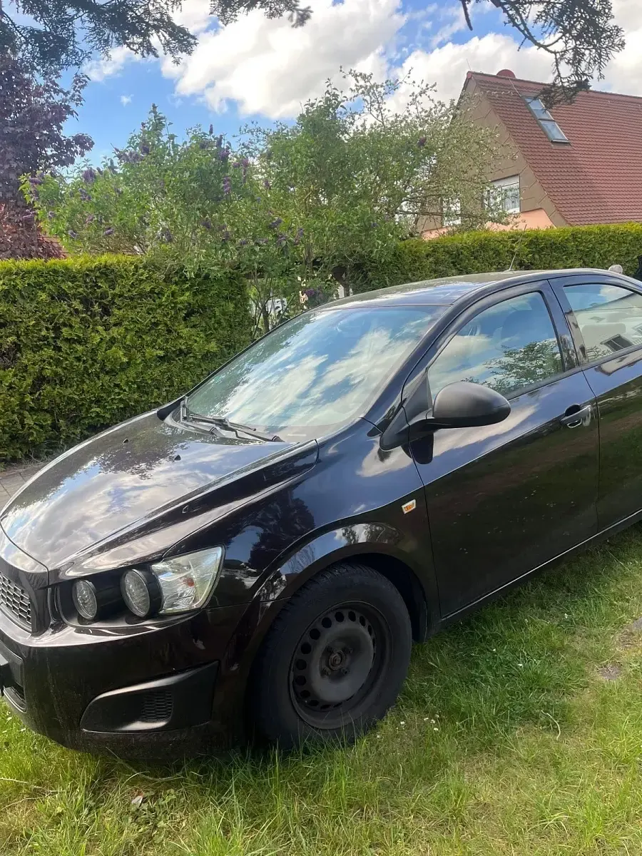 Gebraucht Chevrolet Aveo 101 PS (74 kW) 2013 Braun Limousine