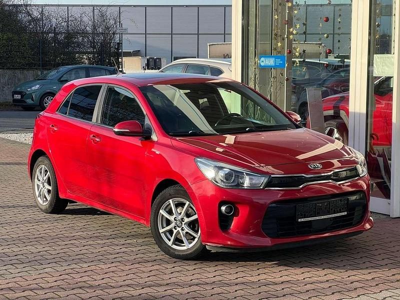 Gebraucht Kia Rio Platinum Edition 120 PS (88 kW) 2017 (beg) signalrot met. Kleinwagen