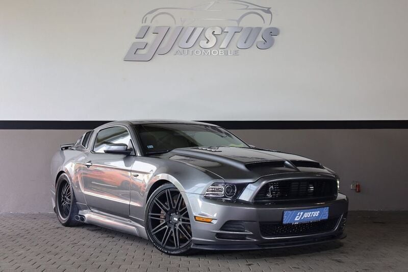 Sterling gray metallic Gebraucht 2014 Ford Mustang GT Coupé | 42.900 € - Bild 1/4