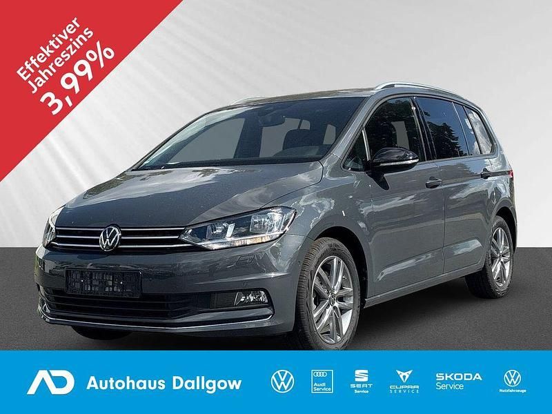 Delfingrau metallic Gebraucht 2024 VW Touran Comfortline Van / Kleinbus | 36.690 € (Teuer) - Bild 1/4