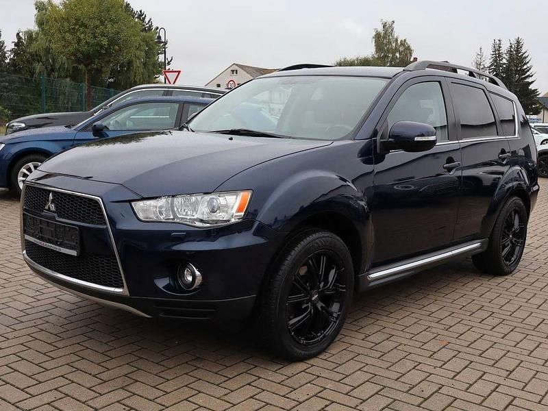 Blau Gebraucht 2011 Mitsubishi Outlander Intense SUV | 6.990 € (Teuer) - Bild 1/4