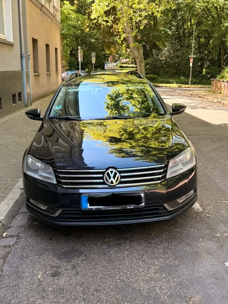 Używany VW Passat 140 KM (102 kW) 2014 Czarny Kombi