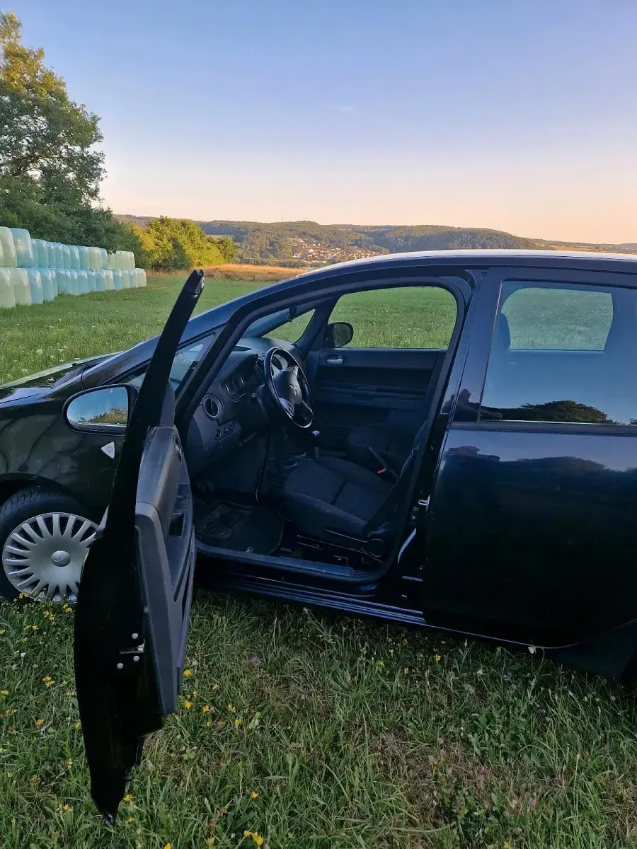 Gebraucht Mitsubishi Colt 95 PS (69 kW) 2013 Schwarz Kleinwagen
