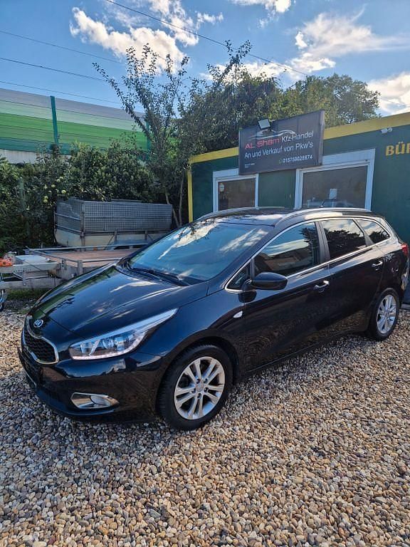 Schwarz Gebraucht 2014 Kia Ceed Sportswagon FIFA World Cup Edition Kombi | 5.950 € (Fairer Preis) - Bild 1/4
