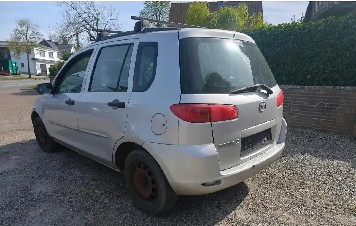 Używany Mazda 3 80 KM (58 kW) 2003 Szary Hatchback
