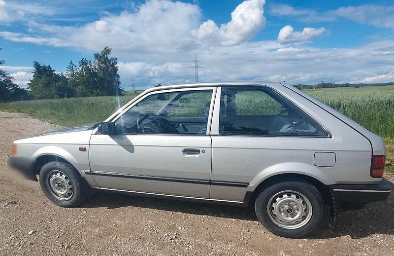 Gebraucht Mazda 323 60 PS (44 kW) 1985 Silber Kleinwagen