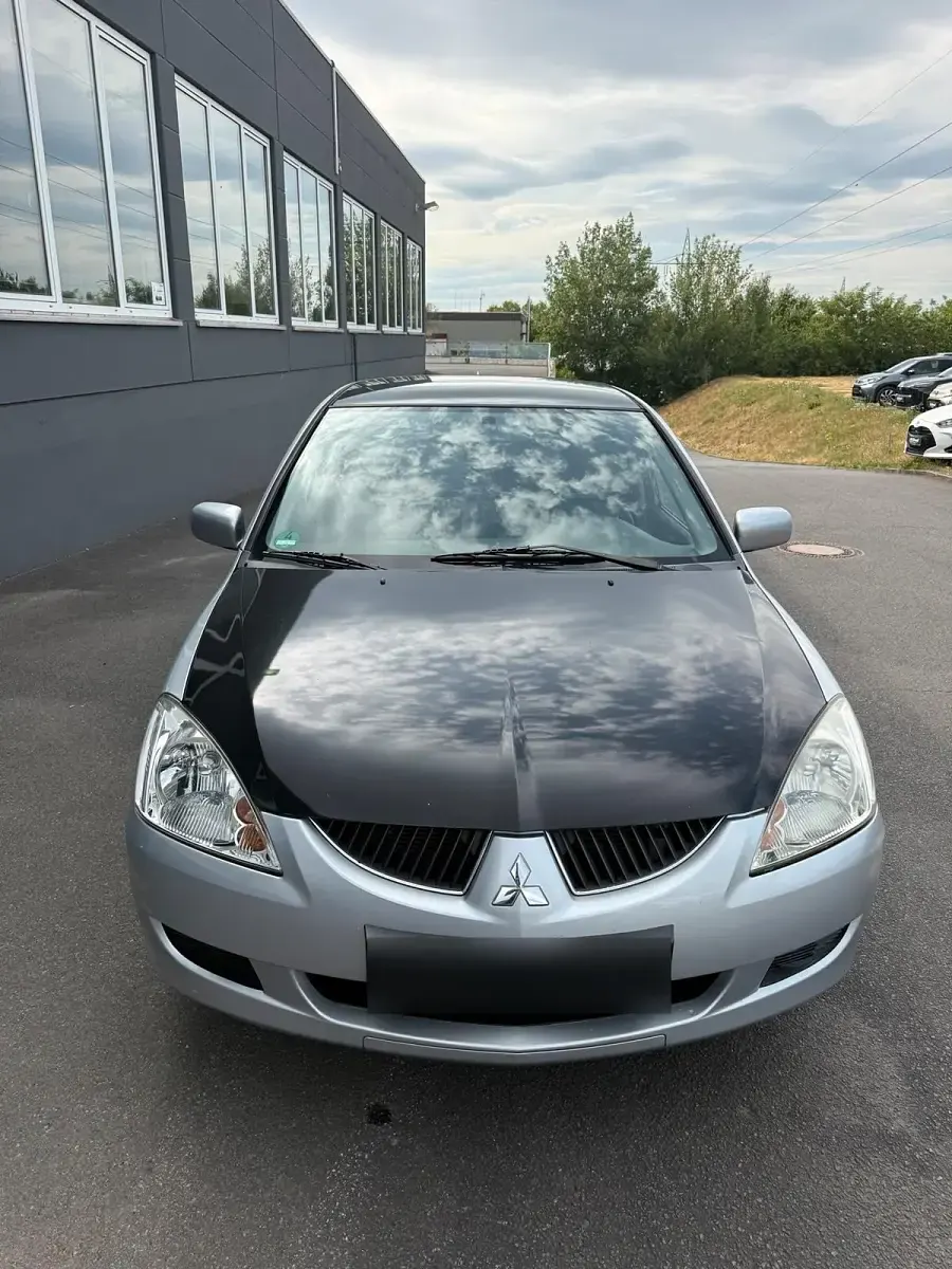 Gebraucht Mitsubishi Lancer 98 PS (72 kW) 2004 Silber Limousine