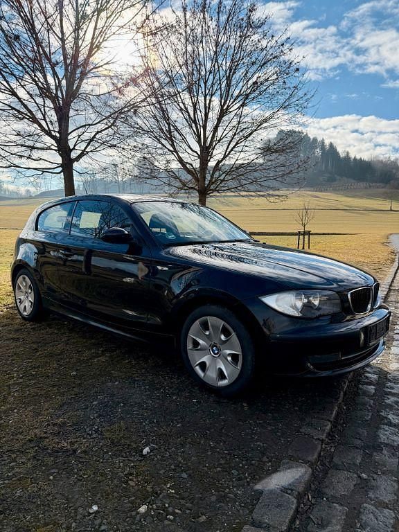 Second-hand BMW 116 122 CP (89 kW) 2009 Negru Hatchback