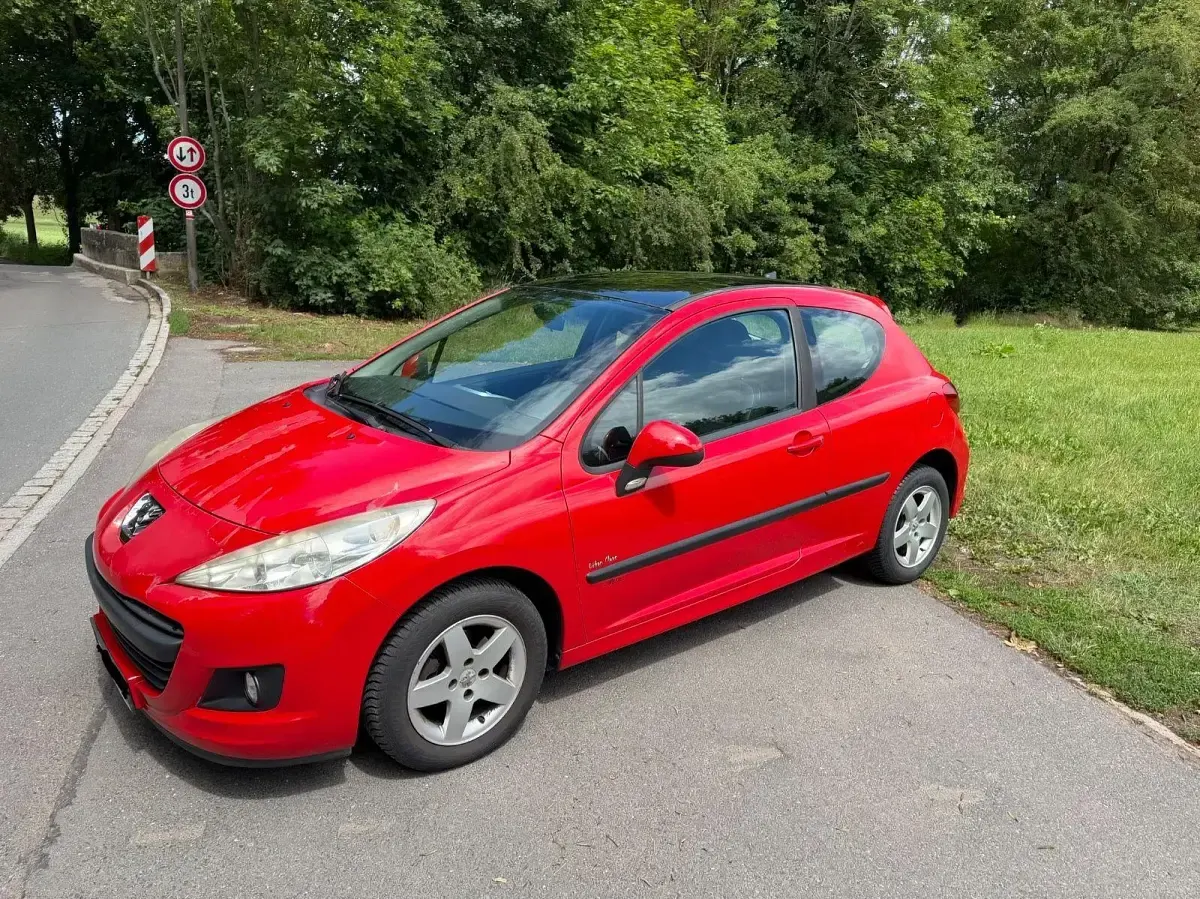Gebraucht Peugeot 207 73 PS (53 kW) 2011 Rot Limousine