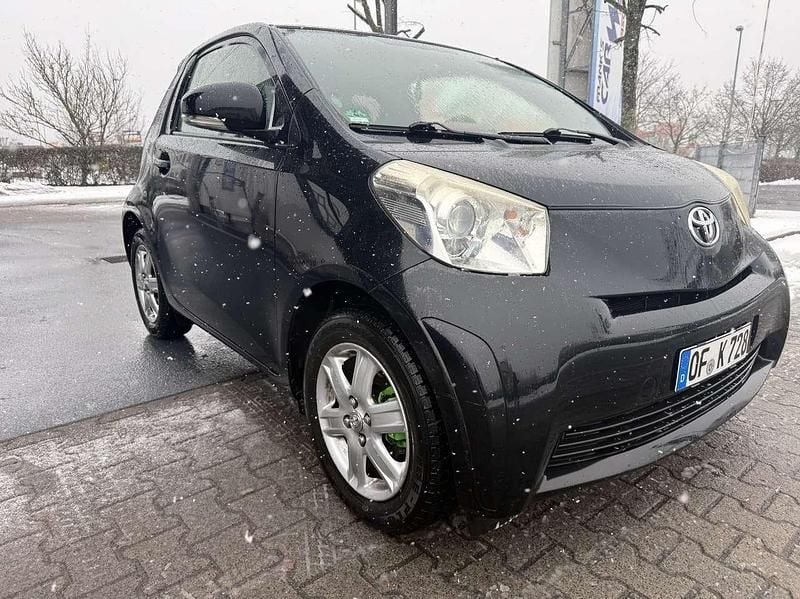 Gebraucht Toyota iQ Basis 68 PS (50 kW) 2011 Schwarz Kleinwagen