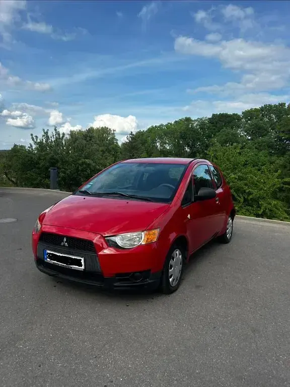 Gebraucht Mitsubishi Colt 75 PS (55 kW) 2009 Rot Kleinwagen