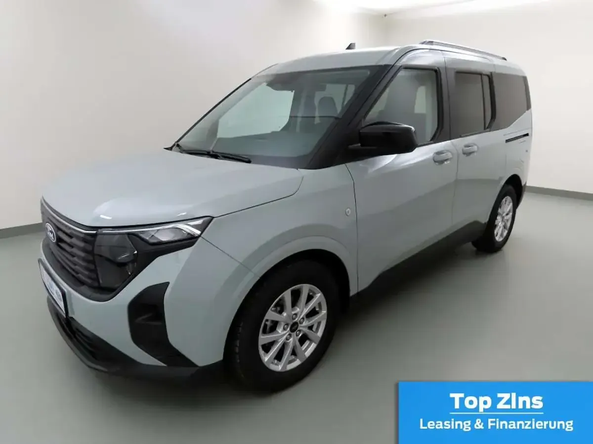 Gebraucht Ford Tourneo Courier Titanium 125 PS (91 kW) 2024 Cactus gray Van / Kleinbus