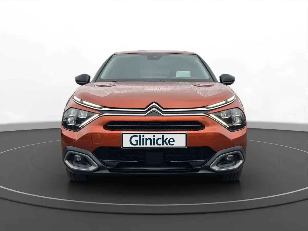 Second-hand Citroën e-C4 Shine 100 kW (136 CP) 2022 Portocaliu Berlinǎ