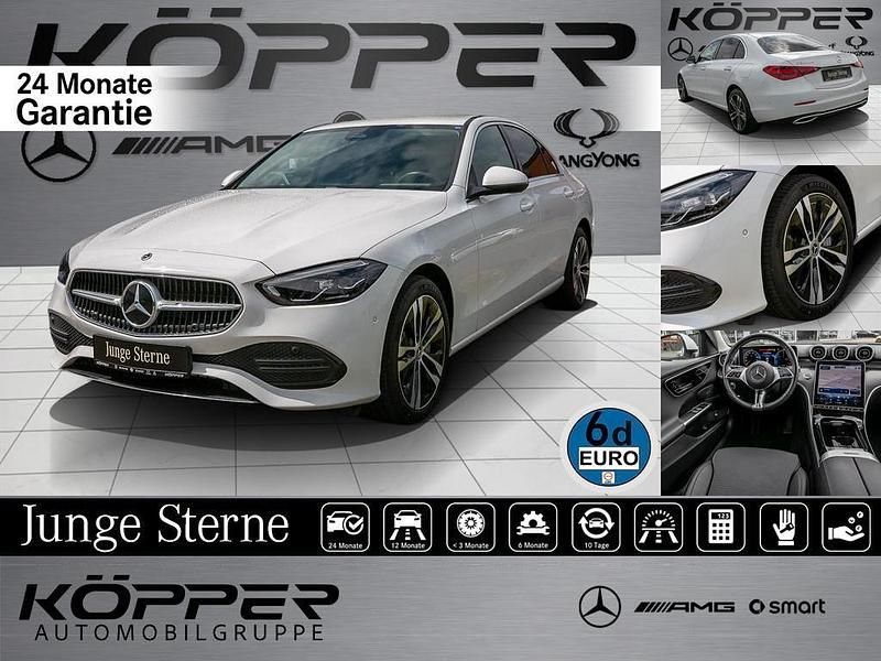 Polarweiss Gebraucht 2024 Mercedes C300e Advanced Limousine | 45.498 € (Fairer Preis) - Bild 1/4